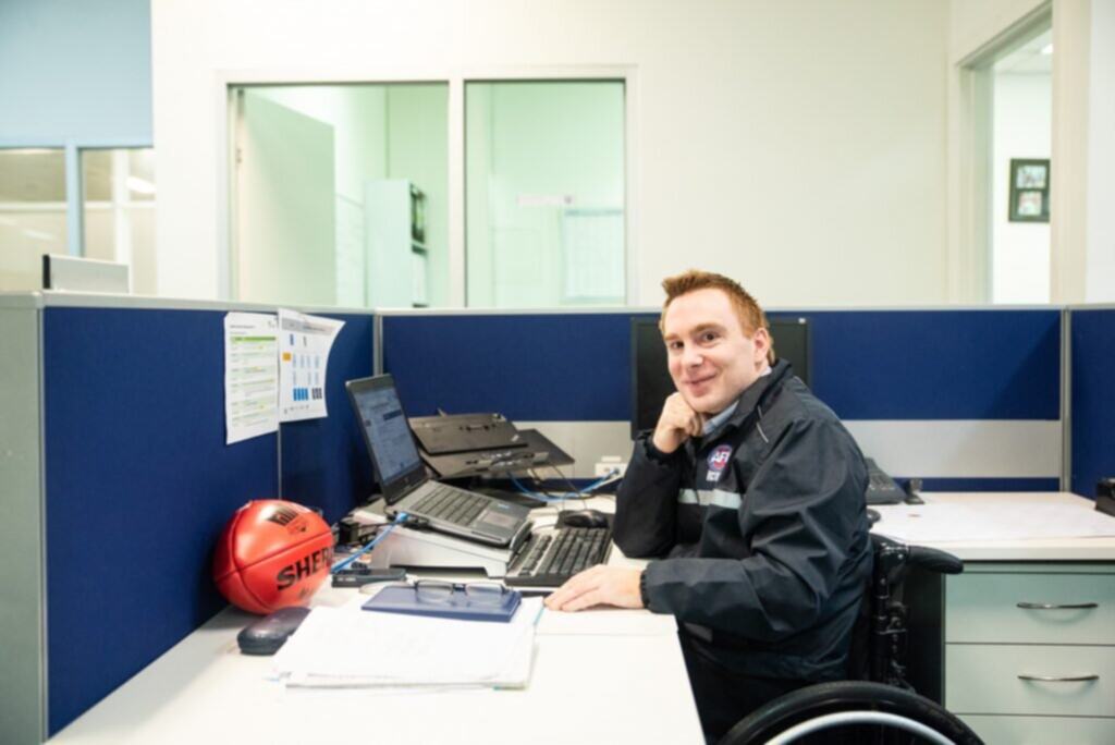 Steve, who has cerebral palsy, is kicking employment goals with AFL Victoria