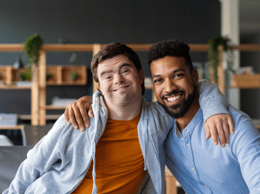 two people smiling