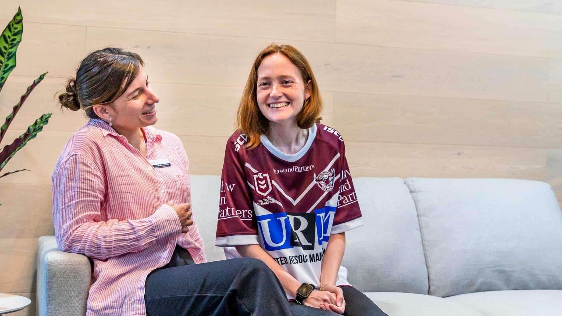 Female counselor providing guidance to a young woman.