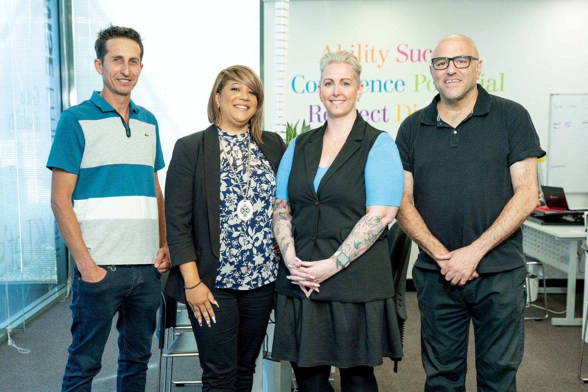 Gus pictured with his employer, Klaud, his employment consultants Laurianne, and business manager Cara